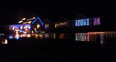 View along Fairlands Road - here a number of homes are lit up.