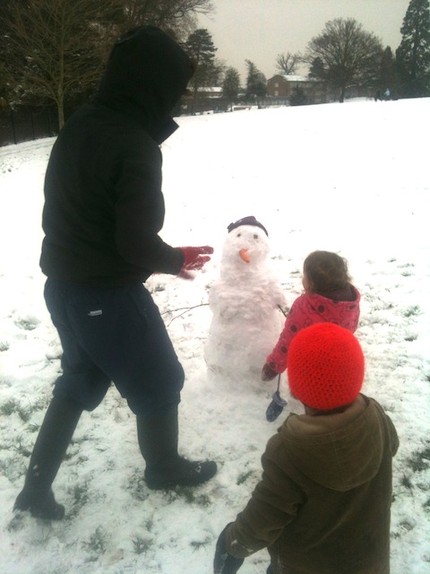 The joys of making a snowman.