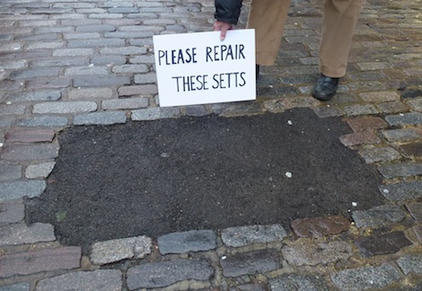 Bodged tarmac repair to the iconic setts as pointed out by Aldermen Bridger and Parke 