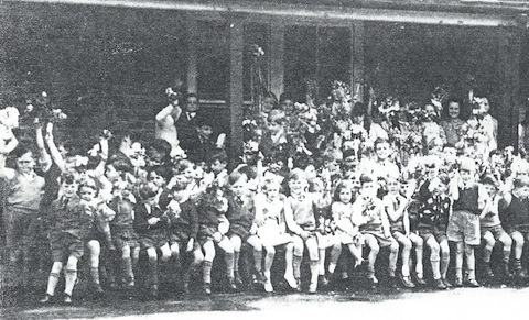The left-hand portion of a photo showing pupils at Ludlow Road School.