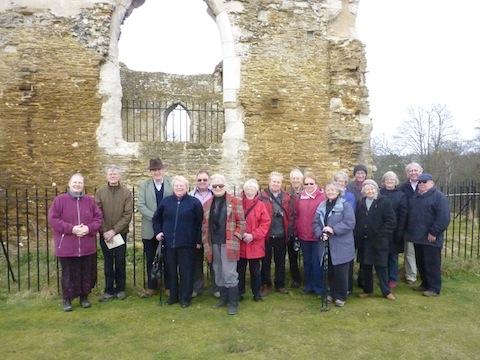 Martin Giles, third from left wearing his rather dashing hat, with members of local history group Little Acorns in front of the ruined St Catherine's chapel.
