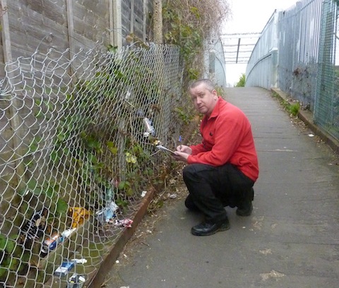 Andy takes note of litter discarded beside a footpath in Stoughton.