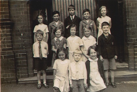 Pupils from Quarry Hill School pictured in 1936. Back row, from left: unknown, George?, John Baker, John, Jill Puttock. Middle row: John Hart, unknown, Joan Newberry, Josie Salmon, David Halsey. Front row: Joyce Harris, unknown, Daphne Salmon. They are pictured in from of St Nicolas' Hall in Millmead Terrace.