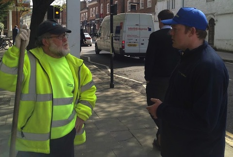 Blue Cap Pete Lambert talks to one of the borough council's street cleaners.
