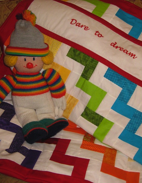 Child's name quilt and playmat -  a colourful rainbow quilt personalised to give as a gift or for your own little one.