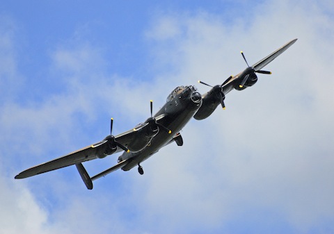 The Avro Lancaster bomber over Brooklands Museum on Sunday, May 12. Photo by Dani Maimone.