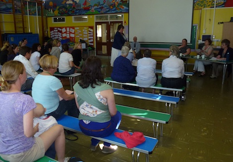 The public meting with an audience made up of parents and local residents