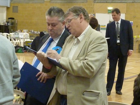 Conservative Keith Witham in discussion with a colleague.