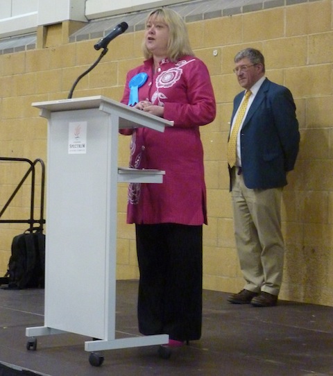 Marsha Moseley speaks on the podium after being re-elected.