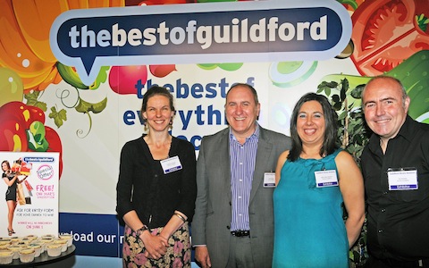 The Best of Guildford's Paul Bridgeland and Sally Castro Gouveia (send from left and third from left) with visitors to the business exhibition.