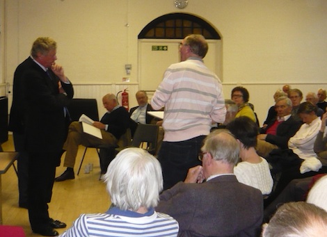Graham Hibbert, organiser of the umbrella Guildford Residents Association, asks his question