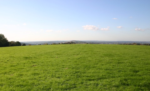 View Westwards from Landing Ground with the end of the Hog's Back in the centre and Guildford Cathedral to the right. 