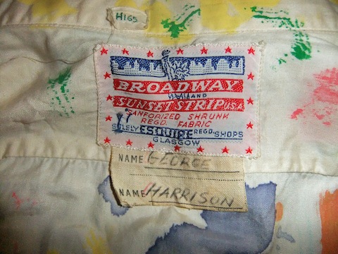 Label in the shirt with George Harrison's name written in ink.