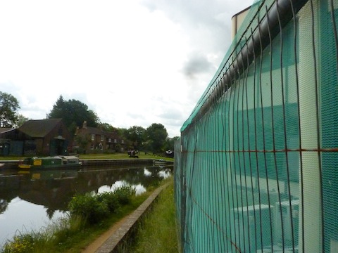 View from the towpath that shows the close proximity of the soon to be demolished 'yellow' office buildings and Dapdune Wharf.