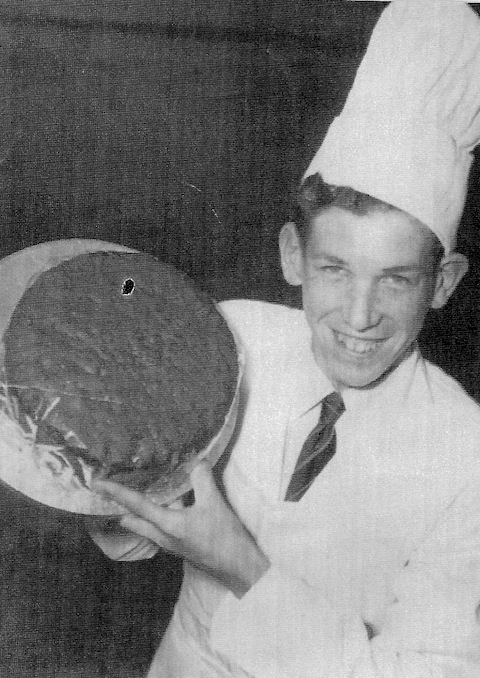 A youthful Brian Holt when he worked for Ayres' bakery. With the firm's managing director William Hambrook, Brian helped bake the plum cake that was presented to the Queen during her visit to Guildford in 1957. It was the first time in 300 years that a reigning monarch had visited the borough, and, as tradition demanded, she was presented with a plum cake as a token of affection - a tradition that goes back to medieval times. Ayres found a recipe that dated back to the 19th century.