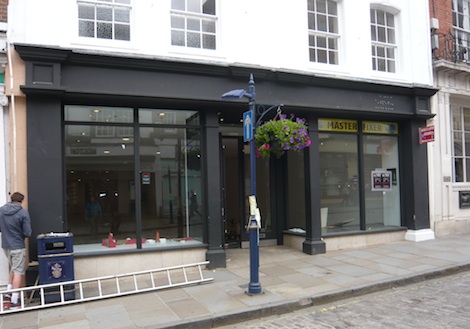 The empty High Street Shop opposite Sainsbury's in The High Street where Anthropologie has applied to hang a sign.