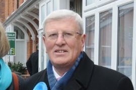 The leader of Surrey County Council, David Hodge.