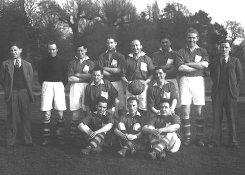 Nelco's football in the 1950s. Arthur Rose is holding the ball.