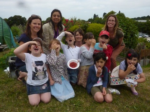 St Joseph’s pupils, and teaching and support staff, enjoy some fruit freshly picked from the school’s allotment garden. Volunteers are required to help tend the plot at the Aldershot Road allotment site that is near the school.
