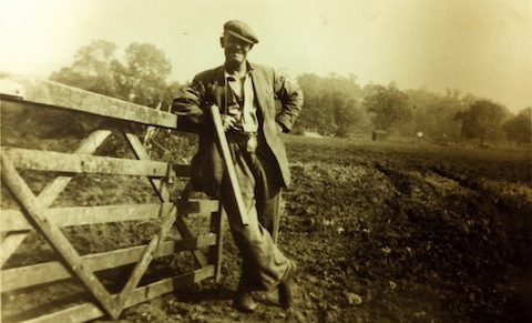Stanley Francis Soan with his shotgun (probably out looking for rabbits). The views looks out towards St Catherine's Lock. It can just be seen in front of the tree line.