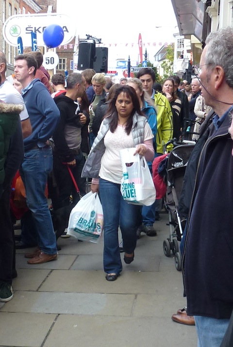 Shoppers battle through the crowd.