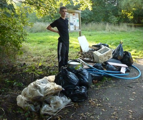 Bin bags with items recovered from the stream and around it. These will be removed by Guildford Borough Council's cleansing department. Branches and logs were removed by Surrey Wildlife Trust and taken to Whitmoor Common where they will be burned.