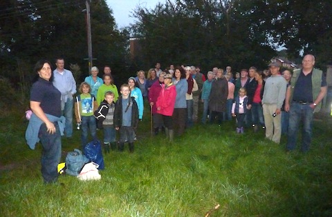 People gather for the bat walk on Broadstreet Common. Surrey Wildlife Trust outreach office Tasha Feddery is pictured far left.