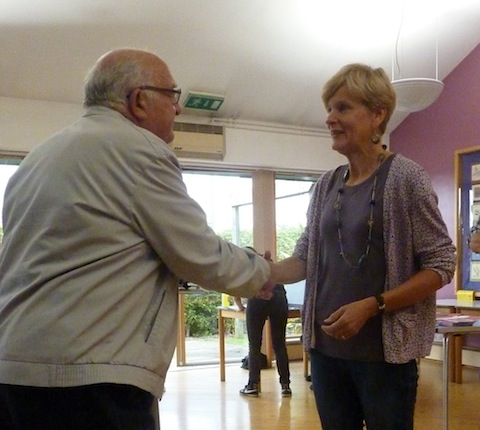 Ron Bennett received his volunteer award from Carol Dunnett of Voluntary Action South West Surrey.