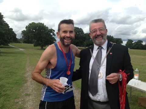 The Mayor of Guildford, David Elms, with the men's winner of the 10k race 