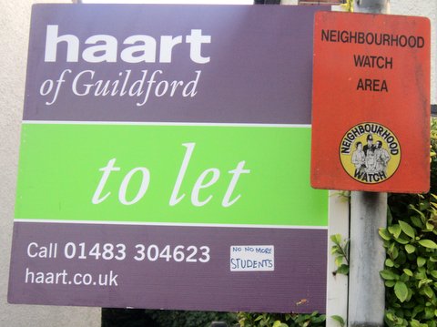 A haart estate agent's to let board with one of the stickers attached to it.