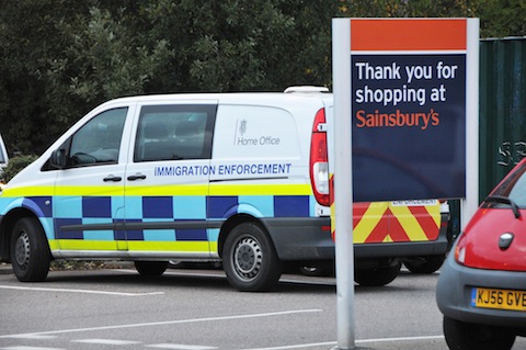 Immigration Enforcement vehicle at the Sainsbury's store in Burpham.