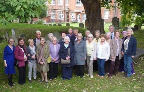 Pewley School's class of '54 reunion group pictured in Trinity churchyard before a lunchtime buffet at the Royal Oak pub.