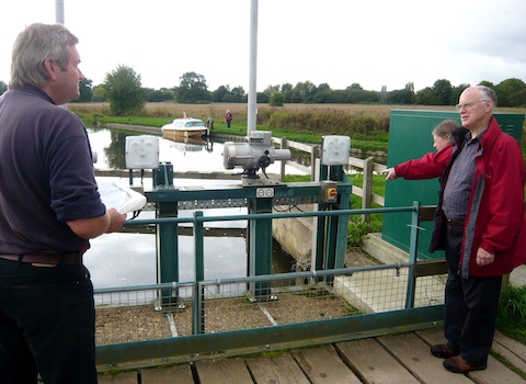 Robert explains some of the workings of the weir by St Catherine's Lock