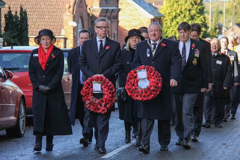 From left: Ash Parish Council clerk Carole Olive; Michael Gove MP; and the chairman of Ash Parish Council, Cllr Nigel Manning, on the parade to the Ash War Memorial.