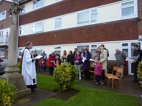 The Rev'd Rod Pierce leads the Act of Remembrance service at the war memorial at Addison Court.