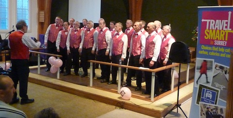 The Surrey Fringe barbershop singers entertain at the Travel SMART event held at St Peter's Shared Church in Bellfields.