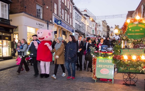 Peppa Pig meets some of her fans in Guildford High Street.