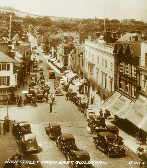 Guildford High Street at about the time when plans were being drawn up to create 'a modern city from an old town'.