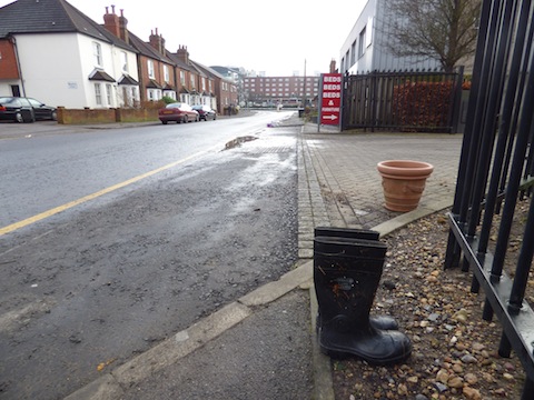 Mary Road, Guildford, now the water has receded – but someone has left their wellies behind!
