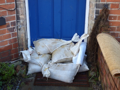 Sandbags in front of a house in Mary Road.