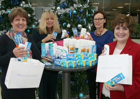 Christmas crisis rescue packs for teenagers: From left: Maggie Knivett, Youth Support Service Homelessness Prevention; Ellie Paterson, Youth Support Service Reparation scheme; Janette Butler, P&G and Cllr Mary Angell, look at what goes into the bags.