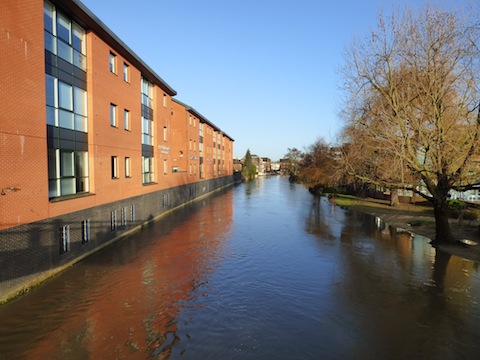 Looking downstream from the footbridge that links Walnut Tree Close and Bedford Road.