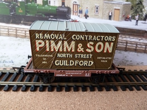 Model railway wagon with a Pimm & Son container.