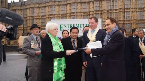 MP Jacqui Doyle-Smith is presented with the Gurkha report.