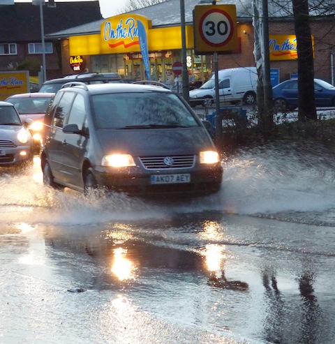 Heavy showers are continuing to cause flash floods on roads in the Guildford area. Here on the A320 Woking Road at the junction of Larch Avenue, the water appears not to have drained away for days.