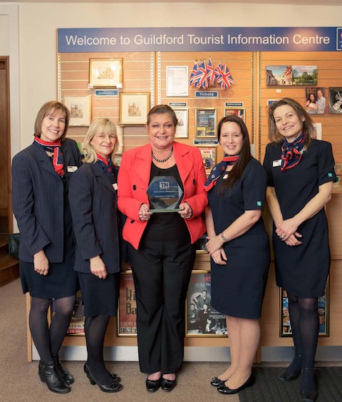 Guildford Tourist Information Centre staff with their award, from left: Elsa Fletcher, Nicola Price, Diana Roberts, Louise Jones and Diana Parker. 