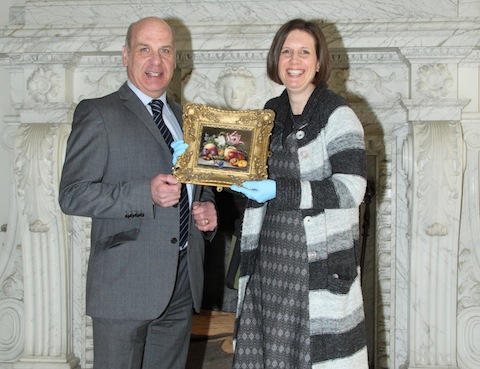 DC Dave Pellatt from Surrey Police and Caroline Sones, house manager at Clandon Park, with the returned item.