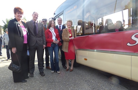 Directors of Safeguard Coaches with the Mayor of Guildford, Diana Lockyer-Nibbs unveil new decals (writing) on one of the buses to commemorate its 90th anniversary.