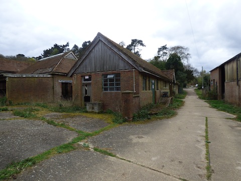 The derelict farm buildings at Tyting Farm.