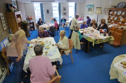 People enjoying Tea and Memories at the Cosy Tea Room at Slyfield Green.